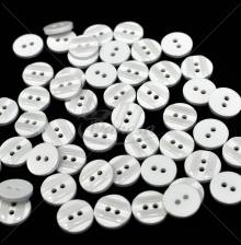 Round white decorative raised two-hole sewing button 20L