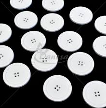 Extra large white four-hole plastic sewing button 44 mm