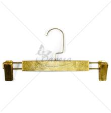 Gold hanger with clips for trousers