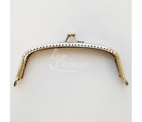 Metal fittings for handbags, wallets and purses