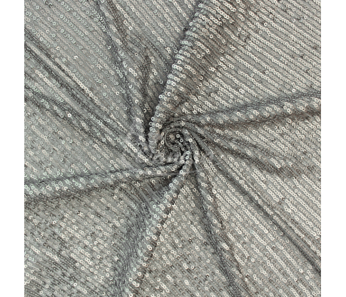 Fabric embroidered with scales