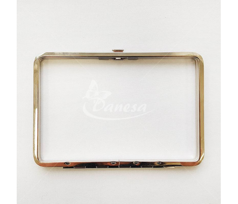 Metal fittings for handbags, wallets and purses