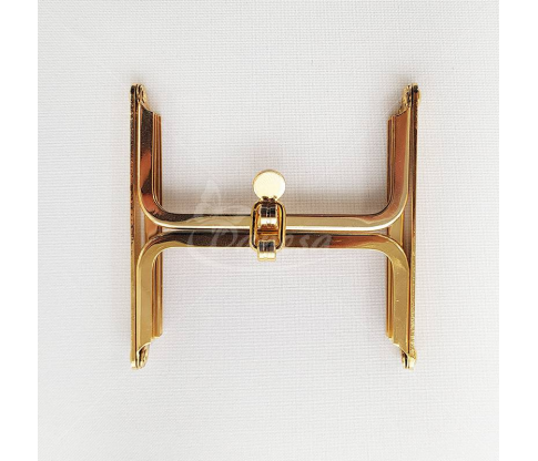 Metal fittings for handbags, wallets and purses