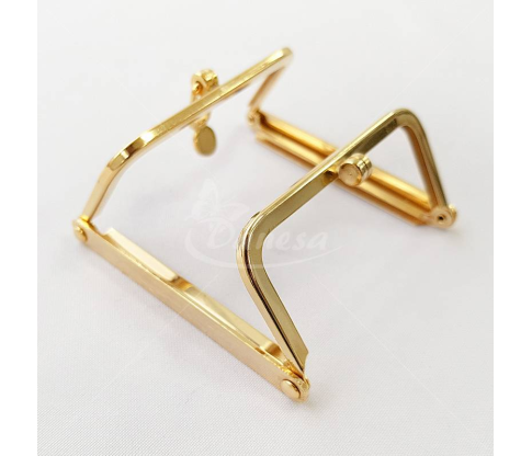Metal fittings for handbags, wallets and purses