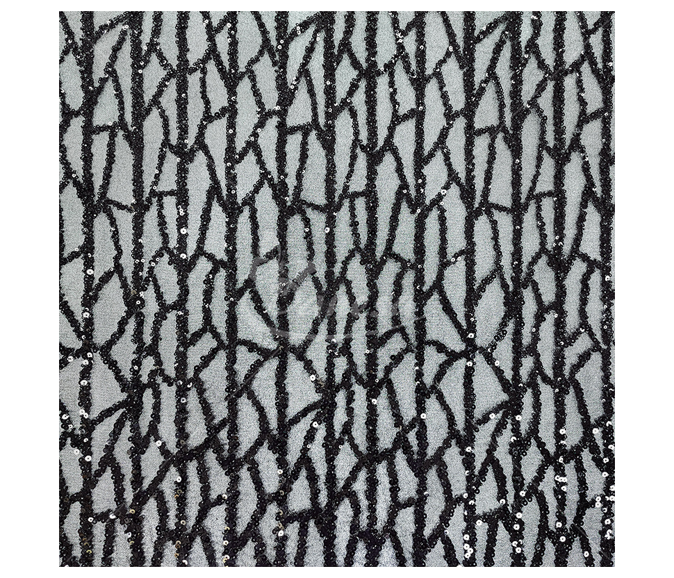Fabric embroidered with scales