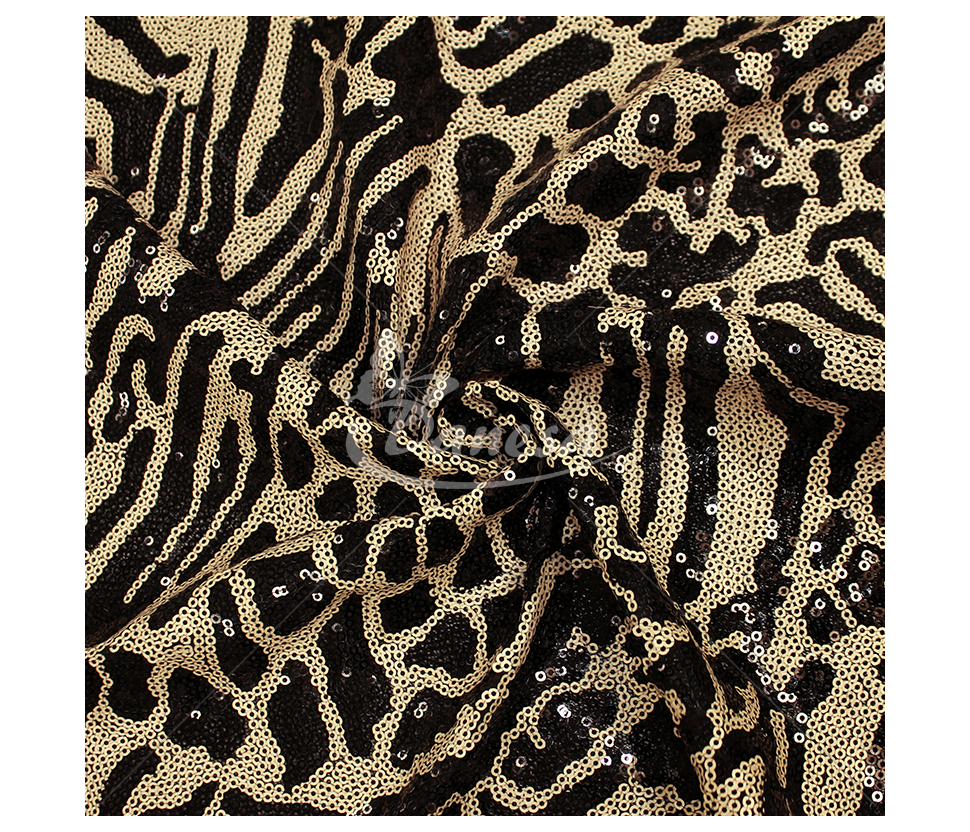 Fabric embroidered with scales