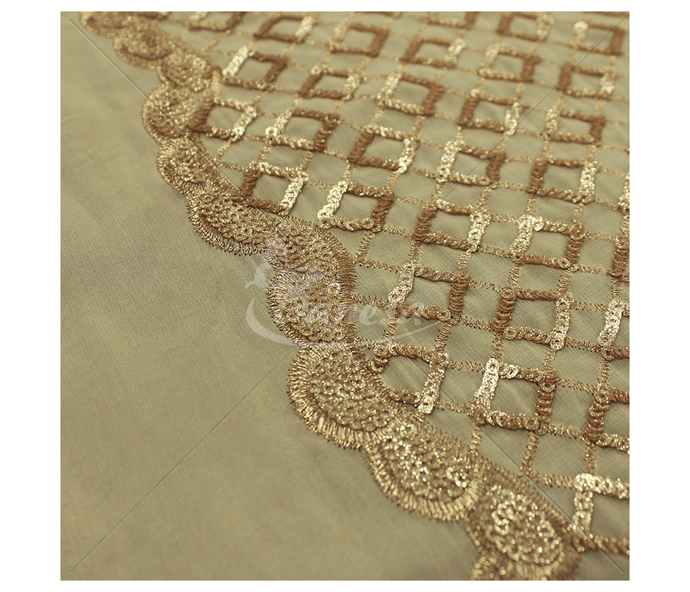 Fabric embroidered with scales