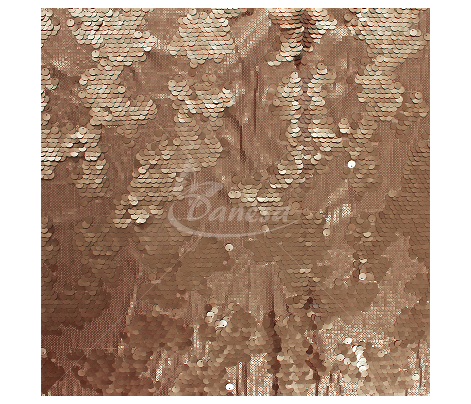 Fabric embroidered with scales