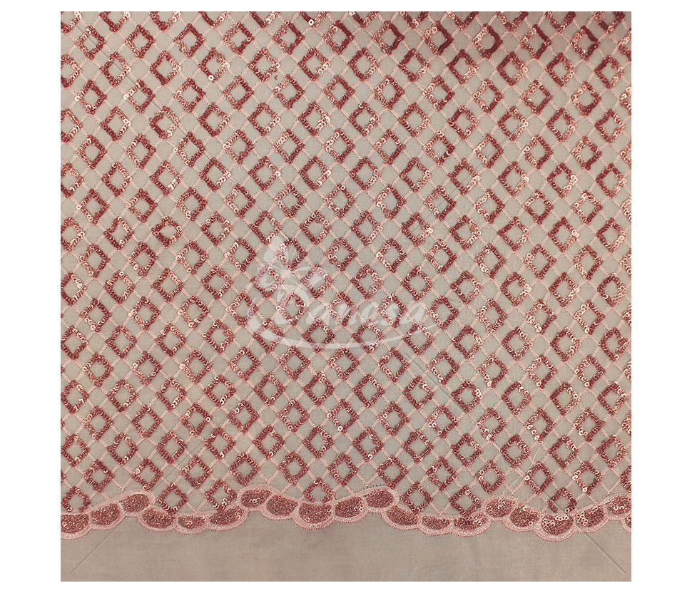 Fabric embroidered with scales