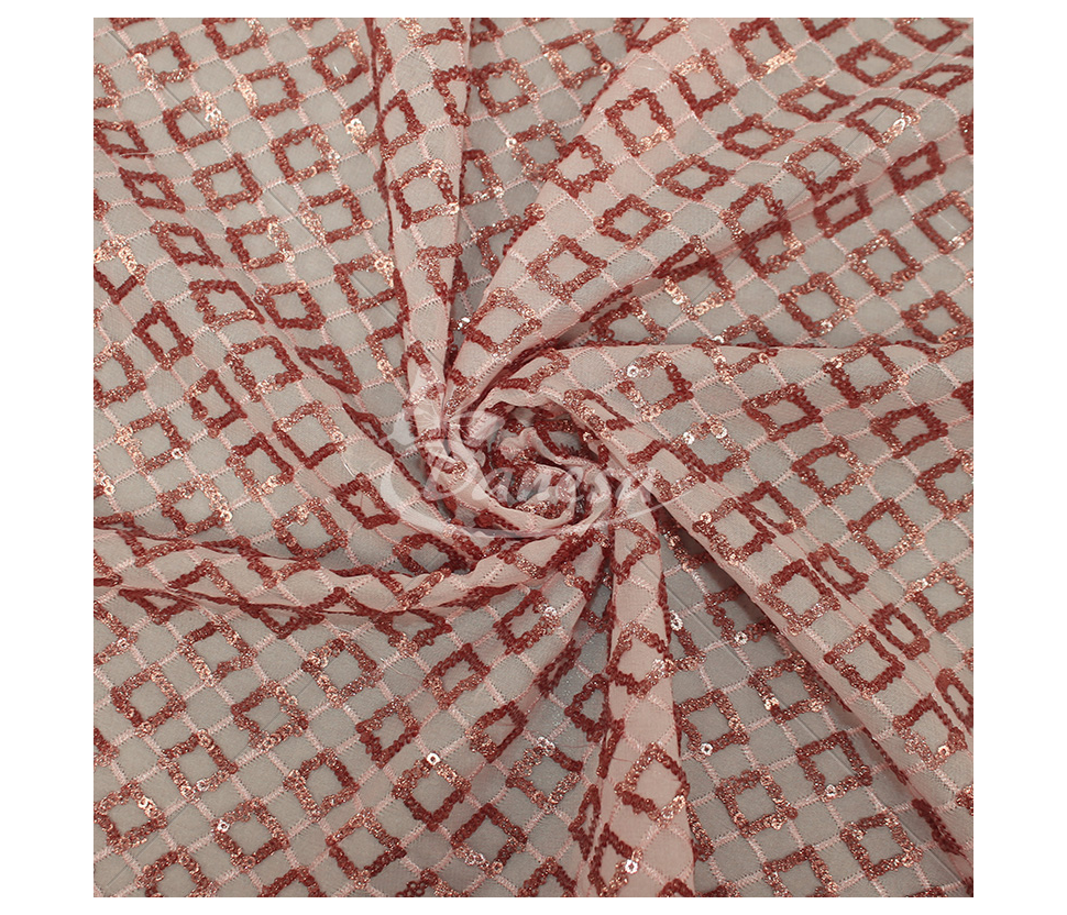 Fabric embroidered with scales