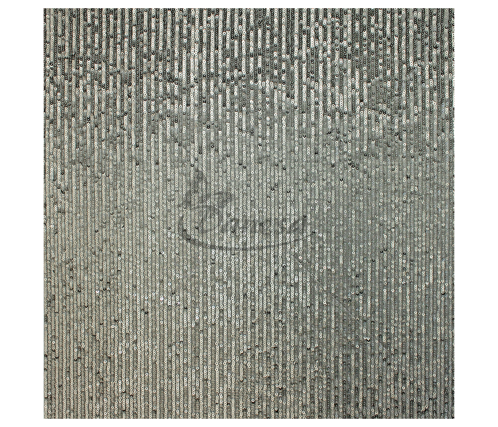 Fabric embroidered with scales