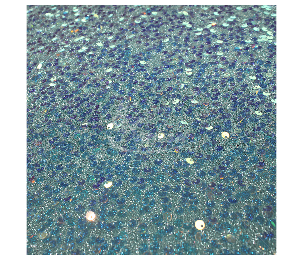 Fabric embroidered with scales