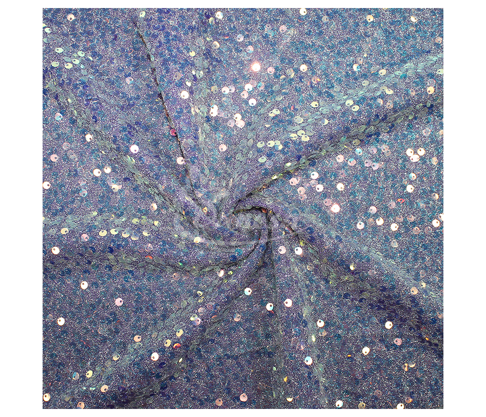 Fabric embroidered with scales