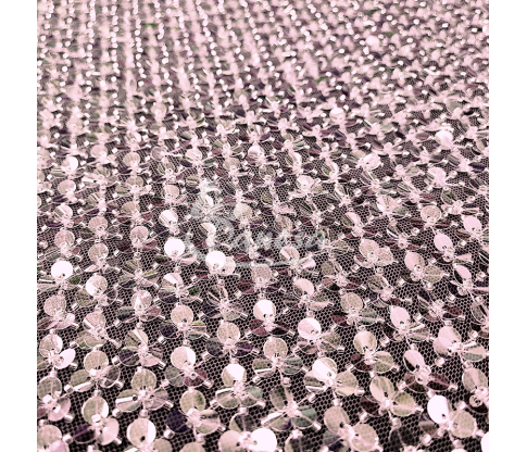 Fabric embroidered with scales