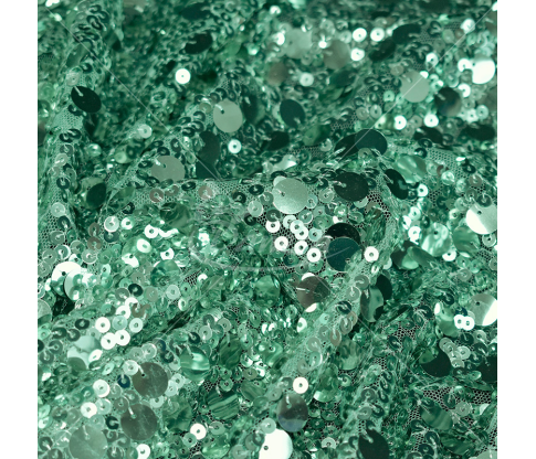 Fabric embroidered different size with sequins, light green color