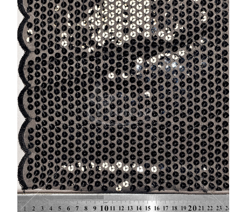 Fabric embroidered with sequins, black color