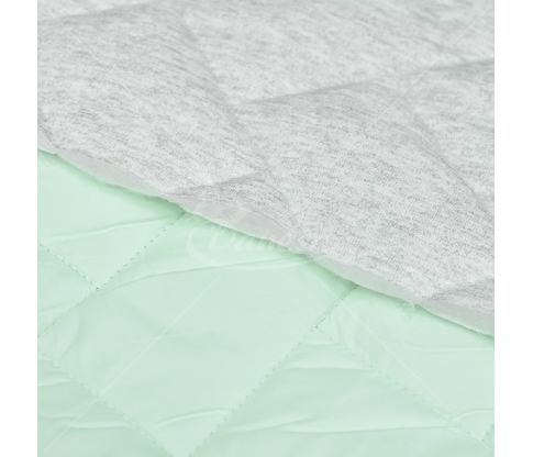 Quilted fabric, pastel green color